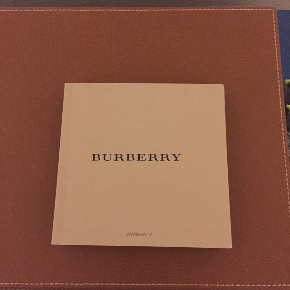 Lot of 4 Burberry watch manuals with warranty card